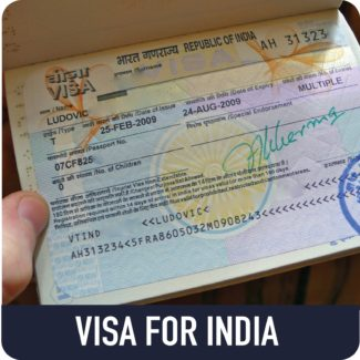Indian visa stamp inside a passport — Visa for India