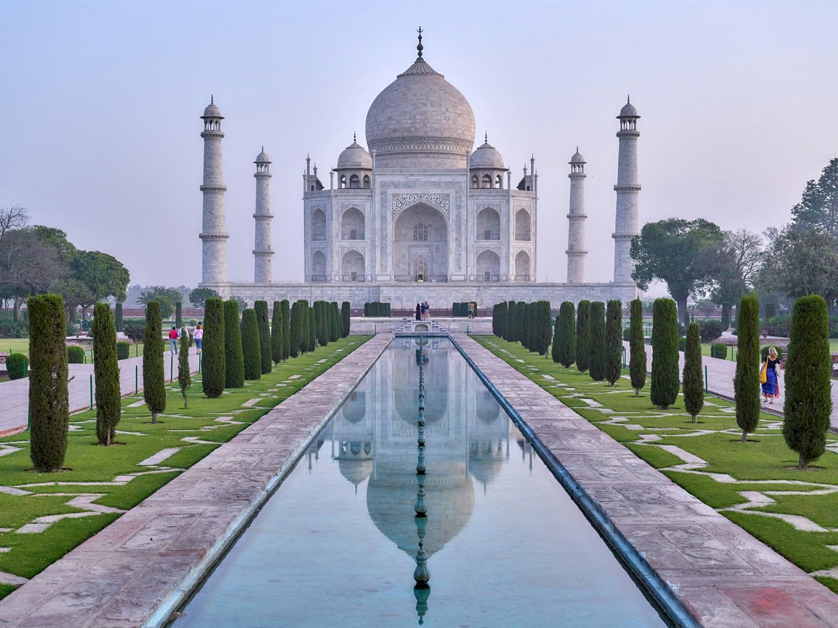 The Taj Mahal and its reflecting pool at dawn